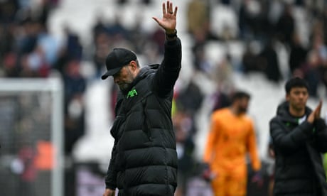 Jürgen Klopp waves to the LIverpool fans after their 2-2 draw with West Ham.